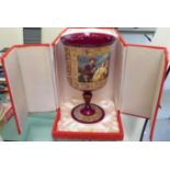 A 20thC ruby glass pedestal vase, transfer decorated with a vignette figure study  13"h  cased