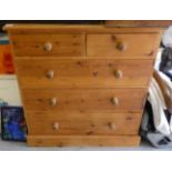 A modern pine chest of drawers with a bank of two short/three long drawers  39"h  36"w