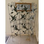 A modern three-fold painted iron garden screen  48"h  13"w closed