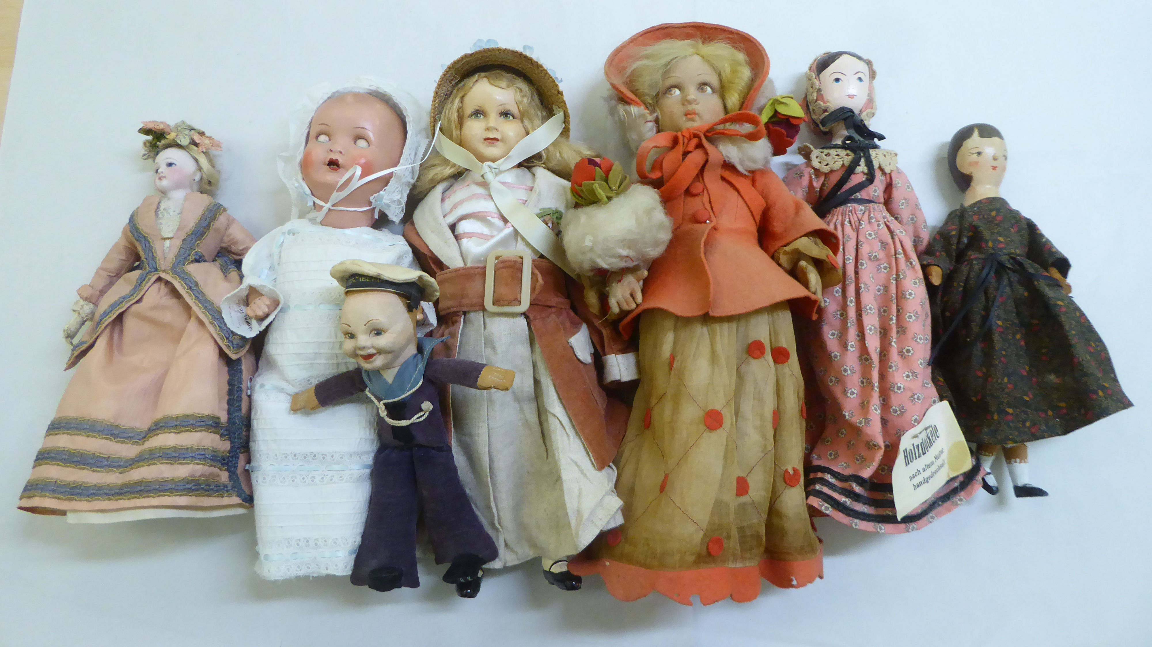 Miscellaneous dolls: to include one dressed in a bonnet and skirt  12"h