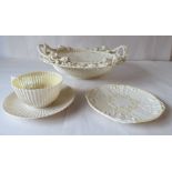 Belleek porcelain creamware: to include a pierced and floral decorated basket  10.5"dia; a cup and