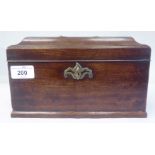 A George III mahogany sarcophagus shape tea casket with a folding brass top handle and pierced