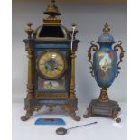 A late 19thC Continental brass and parcel gilt cased mantel clock with Orientally inspired painted