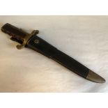 A United States of America M1869 bayonet, the wooden handle with brass mounts, the blade stamped