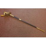 A Royal Air Force dress sword with a portapee, an eagles head pomell, decoratively pierced guard and