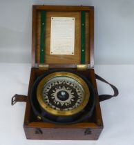 A 20thC Kelvin Bottomley & Baird Ltd of London and Glasgow marine compass, in a matt black and brass