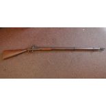 A Victorian percussion action Tower musket with an engraved stock  (Please Note: this lot is subject