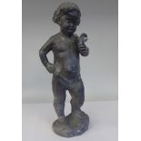 A 19thC cast lead cherub, the infant standing with a bird perched on his finger  17"h