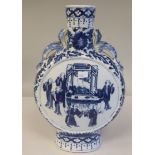 A 19thC Chinese porcelain moonflask with moulded dragon shoulders and a tall, narrow neck, decorated