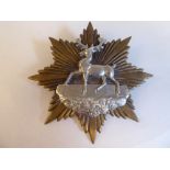 A Stag on a star helmet plate (Please Note: this lot is subject to the statement made in the