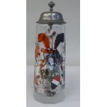 An early 20thC German cut and part frosted glass tankard with an applied pewter, hinged lid and