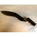 A kukri socket bayonet, the blade stamped IS25 (Please Note: this lot is subject to the statement