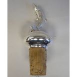 A silver mounted cork bottle stopper, featuring a leaping salmon  Brian Fuller  London 1967