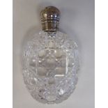 A Victorian hobnail cut crystal perfume flask with a mushroom shape silver cap, on a threaded