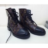 A pair of Louis Vuitton leather boots  size 39.5