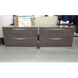 A pair of Camel Group grey wood effect bedside chests with silvered trim, each with two drawers,