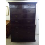 A George III mahogany chest-on-chest with two short over six graduated long drawers, on a plinth