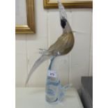 A Murano glass ornament, an exotic bird, on a glass plinth  14"h
