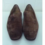 A pair of men's Christian Louboutin brown suede loafers  sized 43