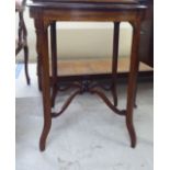 An Edwardian string inlaid and crossbanded mahogany centre table, raised on splayed legs  28"h  23"