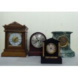 Four dissimilar early/mid 20thC variously cased mantle clocks