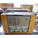 Eight dissimilar vintage and portable radios with examples by Roberts, Hacker & Pye