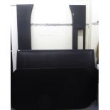 A modern black hide clad bed frame  60"w