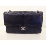 A Chanel, Italy black snakeskin effect handbag