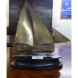 A European white metal model sailing boat  stamped 800, on a plinth  10"h overall