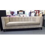 A Bespoke Sofa Company three person, crushed velvet effect, upholstered settee with a level back and