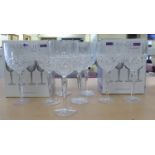 A set of eight Marquis by Waterford crystal pedestal wines