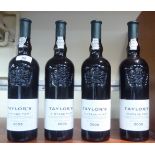Four bottles of Taylors 2009 vintage port