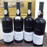 Four bottles of Taylors 2009 vintage port