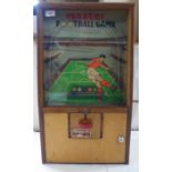 A mid 20thC Mastermatic, Master Football Game, in a light oak end mahogany case  26"h  15"w