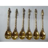 A set of six Continental silver gilt coloured metal apostle end teaspoons  bearing impressed marks