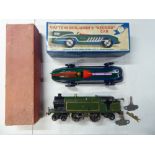 A Hornby 0 gauge clockwork GWR locomotive; and a Schylling Captain Benjamin's 'Record Car'  boxed