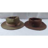 Two Women's Land Army brown/khaki coloured trilbys with badges (Please Note: this lot is subject