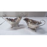 A silver sauce boat and a sugar basin  mixed marks