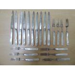 A set of ten silver fruit knives and forks, on abalone handles  Sheffield 1904