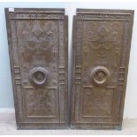 A pair of 19th/early 20thC brass door panels, decorated with griffon scrolled and floral ornament,