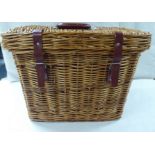A wicker picnic basket with glasses and cutlery for six people  16"h  19"w