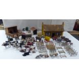 A collection of mainly Britain's painted lead farmyard model animals, accessories and buildings