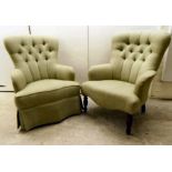 A pair of late Victorian button back armchairs, upholstered in green fabric, raised on baluster legs