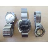 Three circa 1950-1980s stainless steel cased and strapped wristwatches, viz. a Seiko 5 automatic; an