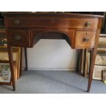 A 19thC lady's mahogany and satinwood inlaid bow front kneehole desk, comprising three drawers