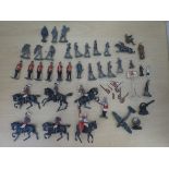 Painted lead model soldiers and similar accessories, some on horseback; and plastic examples