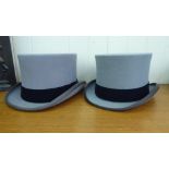 A Moss Bros grey top hat  size 7.1/4; and another sizes 7.3/8