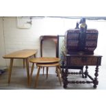 Small furniture: to include an early 20thC (probably Asian) fruitwood, single drawer occasional