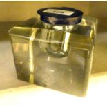 A glass inkwell of box design with a silver lid and collar  marks rubbed