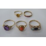 Five 9ct gold rings: to include an example set with a citrine
